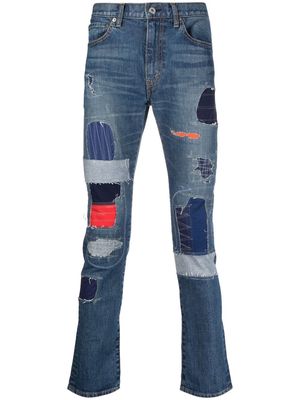 Junya Watanabe MAN patchwork slim-fit jeans - Blue