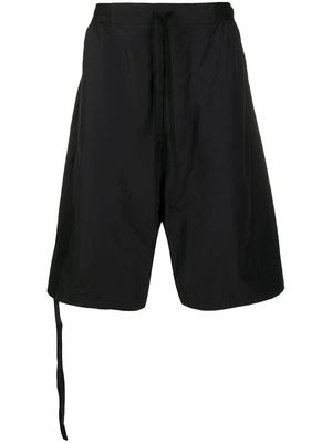 UNRAVEL PROJECT logo-patch drop-crotch shorts - Black