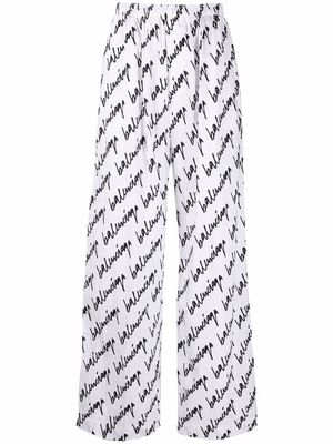 Balenciaga signature logo-print wide-leg trousers - White