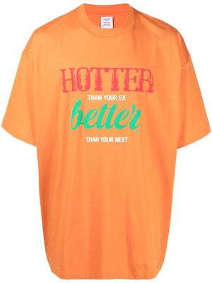 VETEMENTS slogan-print drop-shoulder T-shirt - Orange
