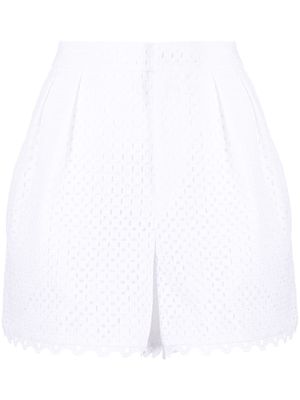 Dice Kayek perforated-design shorts - White