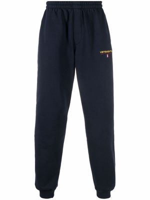 VETEMENTS Haute Couture-embroidered track pants - Blue