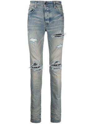 AMIRI MX1 ripped skinny jeans - Blue