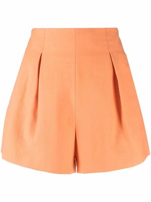 THE ANDAMANE high-waisted pleated shorts - Orange