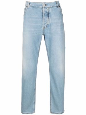 Balmain embossed-logo slim-cut jeans - Blue