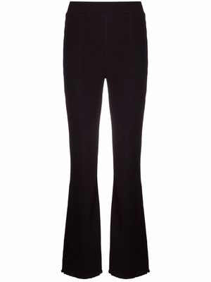 Holzweiler plissé flared trousers - Black