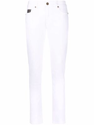 Versace Jeans Couture logo-embroidered skinny trousers - White