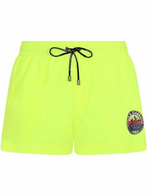 Dolce & Gabbana logo-print swim shorts - Yellow