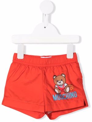 Moschino Kids Teddy Bear-print swim shorts - Red