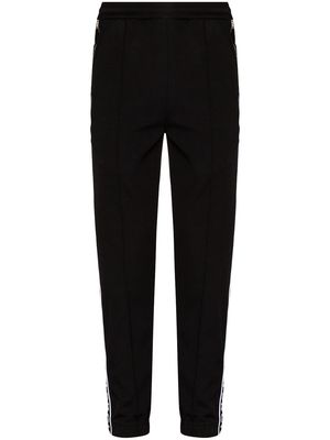 Givenchy logo-stripe track pants - Black