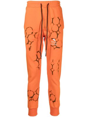 Mauna Kea logo-print detail track pants - Orange