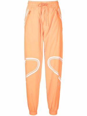 adidas by Stella McCartney logo-print lightweight track pants - Orange