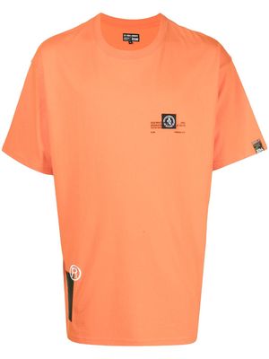 izzue logo-print oversized T-shirt - Orange