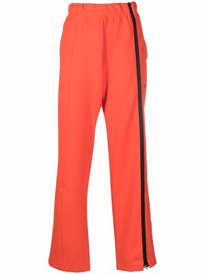 adidas by Stella McCartney logo-print zip-up track pants - Orange