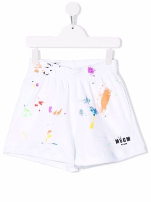 MSGM Kids paint splatter-print shorts - White