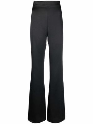 THE ANDAMANE high-waisted flared trousers - Black