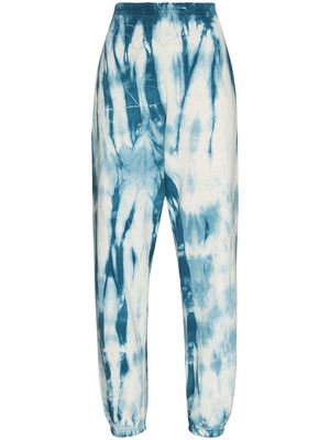 Come Back As A Flower tie-dye tapered track pants - Black