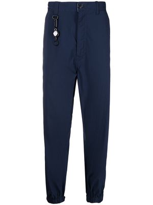 izzue logo-patch straight-leg trousers - Blue
