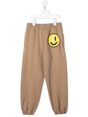 Natasha Zinko Kids pixel print joggers - Brown