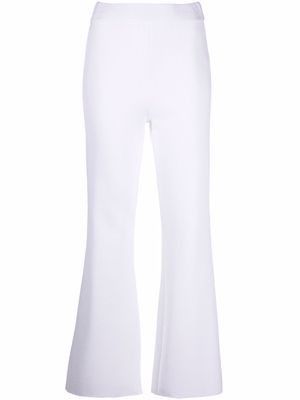 Charlott flared stretch-fit trousers - White