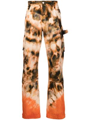 AMIRI tie dye-print straight-leg trousers - Orange