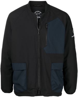 White Mountaineering logo-patch bomber jacket - Black