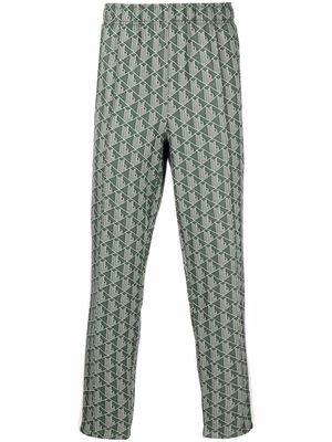 Lacoste all-over logo-print trousers - Green