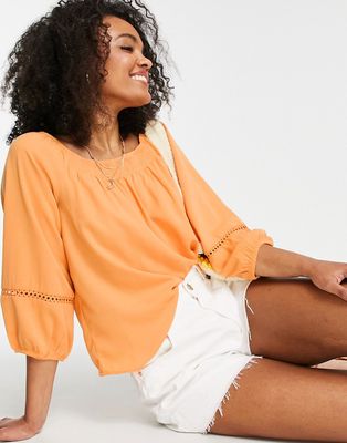 JDY off the shoulder top with lace cut work in orange