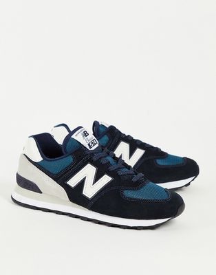 New Balance 574 sneakers in black and gray