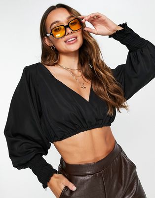 ASOS DESIGN batwing wrap top with shirred sleeves in black