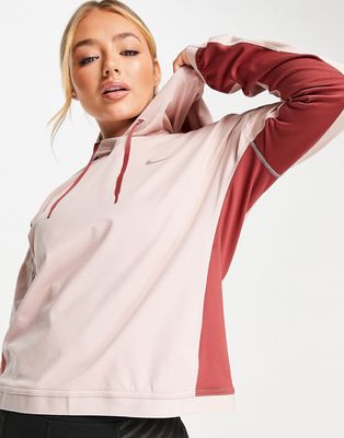 Nike Running Therma-FIT pacer hoodie in pale pink