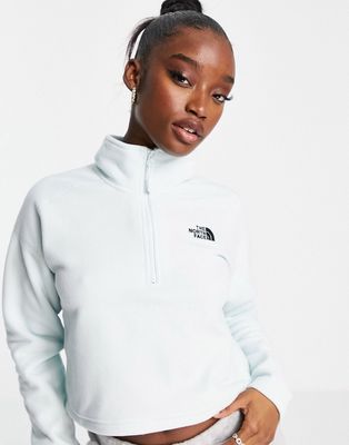 The North Face 100 Glacier 1/4 zip cropped fleece in light blue Exclusive at ASOS-Blues