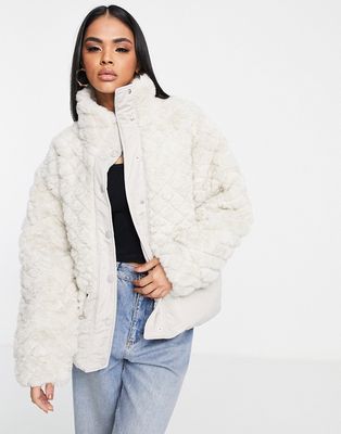 QED London contrast diamond stitch faux fur coat in stone-Neutral