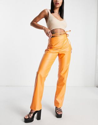 Missyempire straight leg leather look pants with strappy waist detail in orange