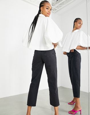 ASOS EDITION tapered jean with twisted seam in black