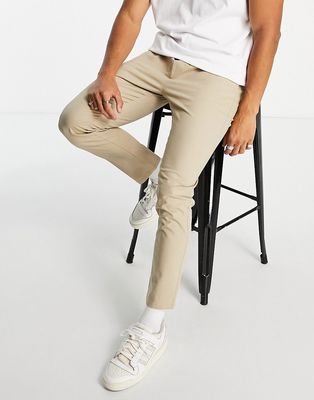 ASOS DESIGN skinny chinos with elasticated waist in stone-Neutral