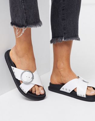 Truffle Collection buckle flat sandals in white