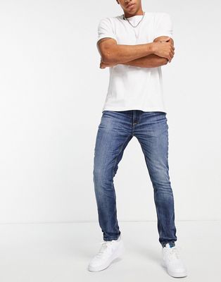 River Island skinny jeans in dark blue-Blues