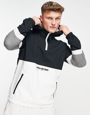 Hollister front & back logo overhead color block hooded jacket in black/white/gray