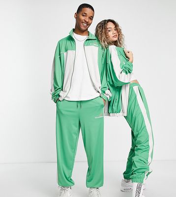 COLLUSION Unisex track sweatpants in green - part of a set
