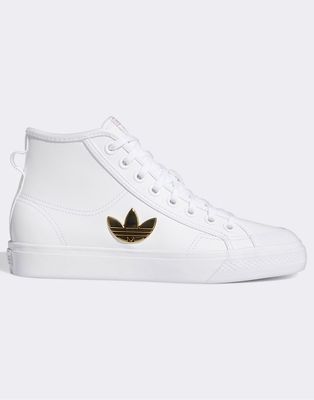 adidas Originals Nizza mid sneakers in white with gold logo