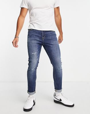 Only & Sons slim fit tapered ripped jeans in mid blue