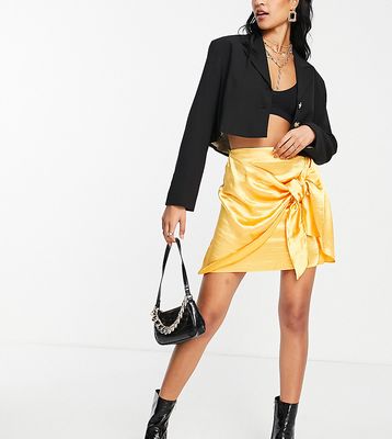 ASOS DESIGN Tall satin mini skirt with knot detail in yellow