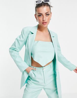 Annorlunda relaxed blazer in green twill - part of a set