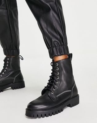 ASRA Exclusive Billie lace-up flat boots with stitch detail in black leather