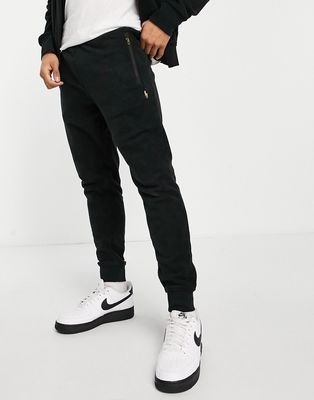 Polo Ralph Lauren gold player logo sweatpants in black