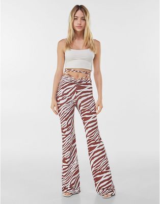 Bershka wide leg zebra print pants with strap detail in brown