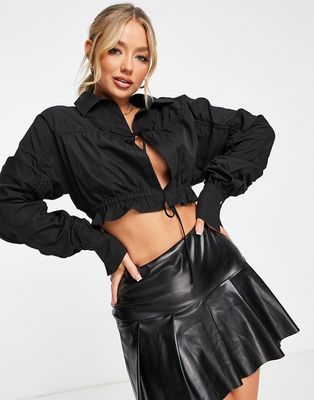 Aria Cove plunge front ruffle sleeve crop top in black