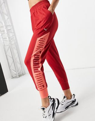 Puma Training sweatpants in pink with red panels & cream logo exclusive to asos