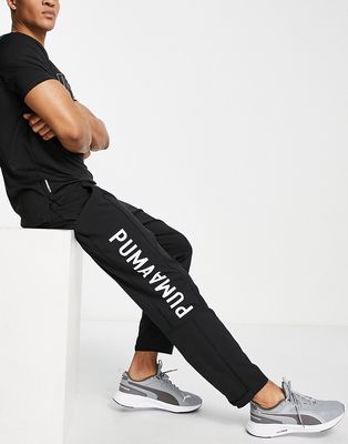 PUMA Training side logo woven sweatpants in black